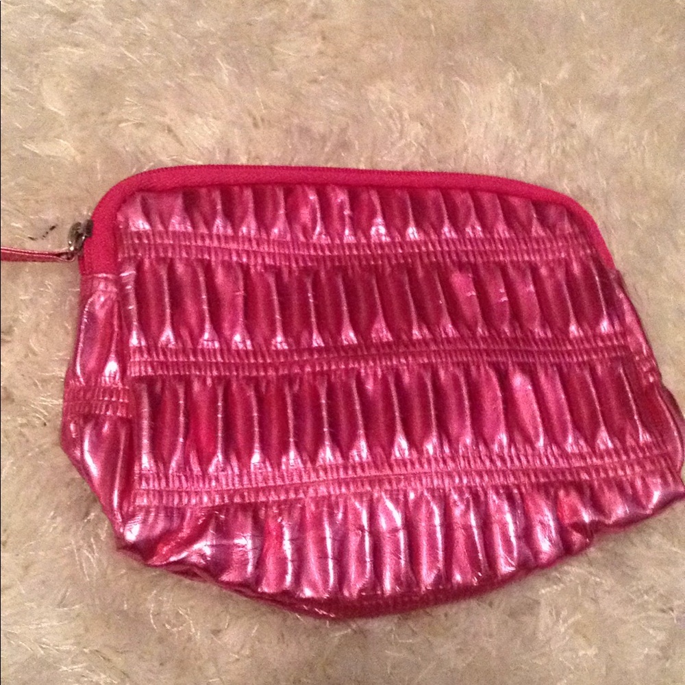 A small pink clutch